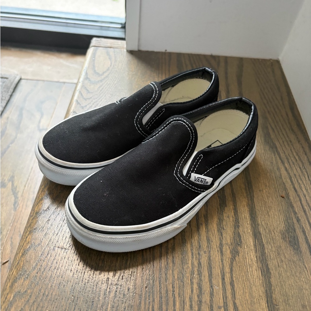 Vans Black and White Slip-On Canvas Sneakers